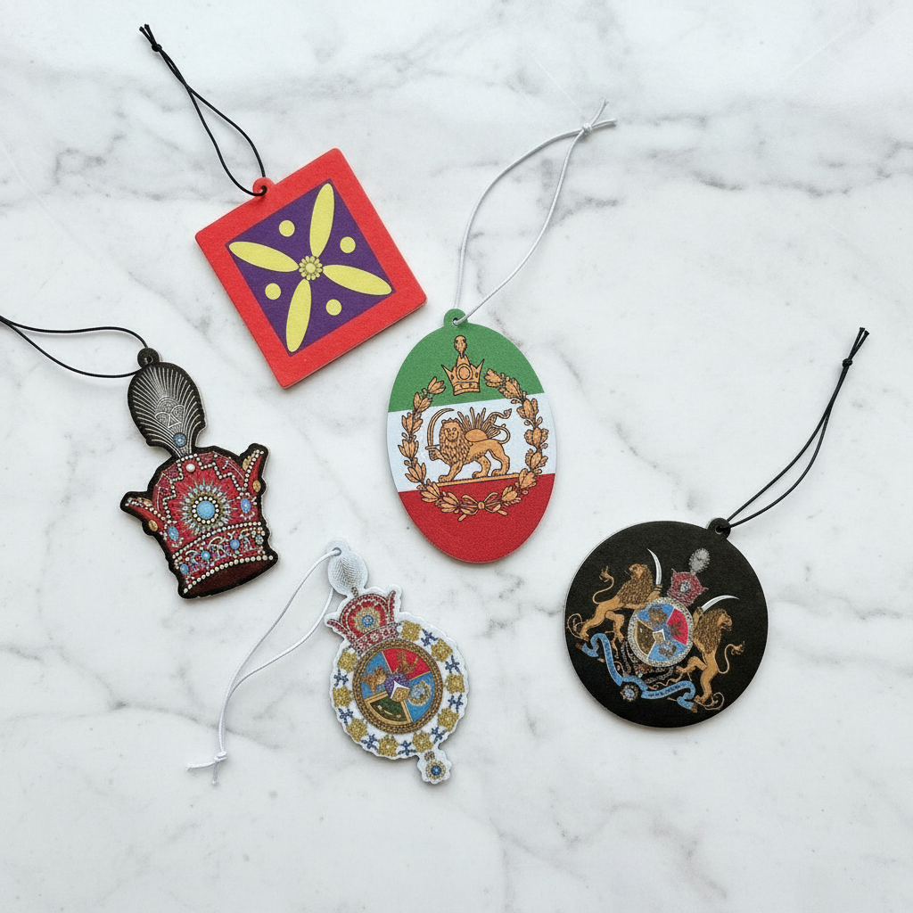Five Persian Pride air freshener designs displayed on white marble